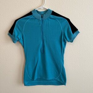 Women’s Ibex turquoise blue wool short sleeve cycling jersey, size Small
